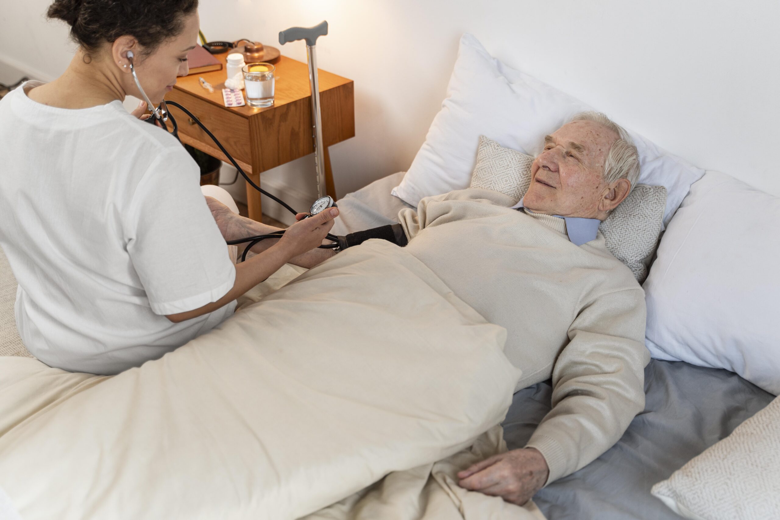 doctor-checking-blood-pressure-male-patient